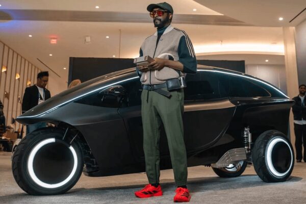 the Trinity, a 2,000-lb, carbon fiber vehicle that looks better than those in futuristic Tron movies, built in collaboration with West Coast Customs. Capable of 0 to 60 mph in under 2 seconds, the car features an agentic core.